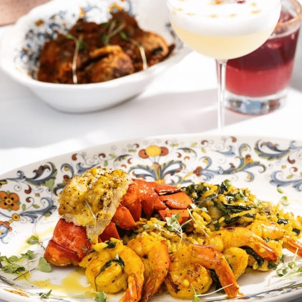 Primavera Ristorante's lobster and shrimp dish with risotto, meatballs, and cocktails.